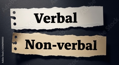 Visual representation of Verbal and Non-verbal communication concepts with torn paper strips on dark background for educational or presentation use