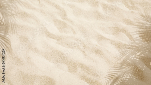 Selective focus of summer and holiday  backgrounds concepts with closeup clean sand beach and shadow palm leaf