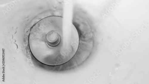 Canvastavla Running water left unused in daily routines highlights excessive consumption and environmental impact, reminding us to practice water-saving habits for sustainability and global responsibility
