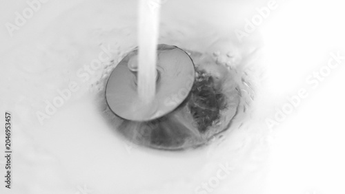 Cuadro en lienzo Running water left unused represents household resource waste, encouraging awareness and action toward sustainable water use to help preserve clean water supplies for the future