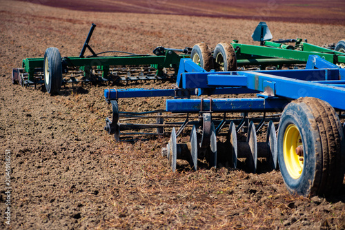 Slika na platnu Tillage equipment prepares soil for farming