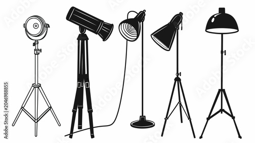 Black and white vector illustration of studio lights on stands isolated on white