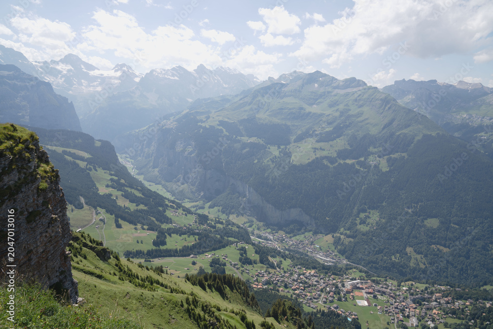 Fototapeta premium Switzerland, mountain peak and natural landscape, with panorama, in august, landscape