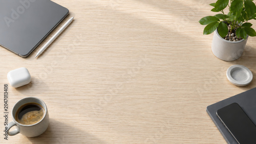 Modern desk workspace wood table coffee cup tablet smartphone Minimal modern desk workspace wood table with coffee cup, tablet, smartphone