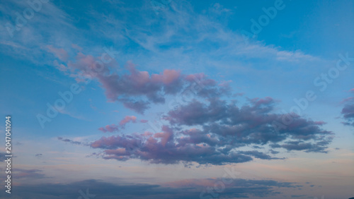 A sunny day in Türkiye, a colorful, vibrant blue sky and thin, white, tinted clouds.