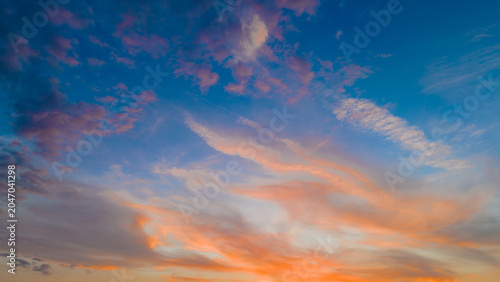 A sunny day in Türkiye, a colorful, vibrant blue sky and thin, white, tinted clouds.