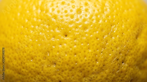Close Up of Bright Yellow Lemons with Textured Skin in Natural Light