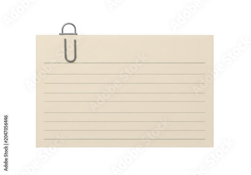 Paperclip resting on lined paper
