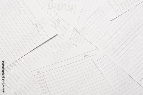 Obraz na plátně Full frame of scattered blank lined notebook papers background