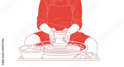Person working on pottery wheel.