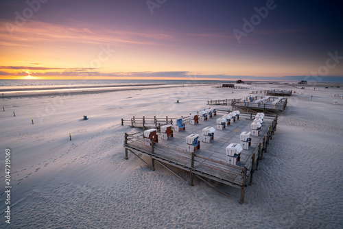 idyllic place on the beach in sunset light