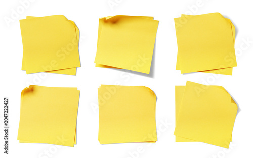 Sticky note reminder. Post it note paper. Yellow sheets for notes isolated with on background.