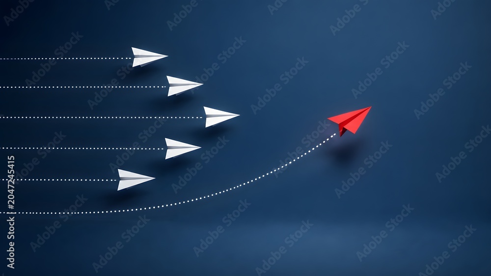 Naklejka premium Red paper airplane changing direction from white airplanes on dark blue background, symbolizing leadership, disruptive innovation and strategic vision