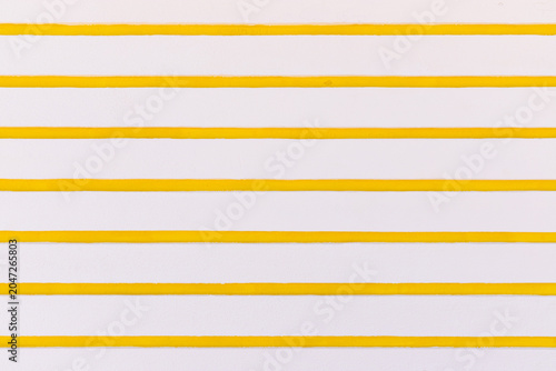 White and yellow striped background