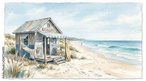 Beach house with surfboard on sand.