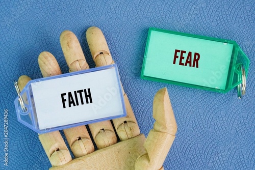 Photos Two opposite words Fear or Faith, choose Faith