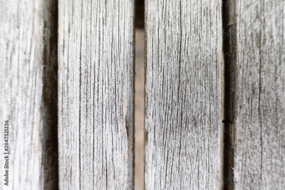 Fototapeta premium Weathered Grey Wood Slats Texture – Symbol and Background Structure for Housing Market, Construction Costs, Material Scarcity