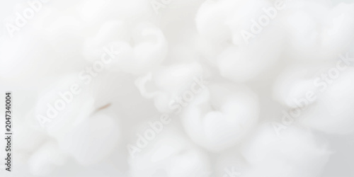Obraz na plátne Soft, fluffy white cotton balls fill the frame in a close-up, detailed shot, evoking a sense of purity and gentle texture