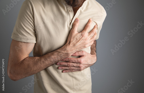 Canvas Print Caucasian man suffering from heart ache.
