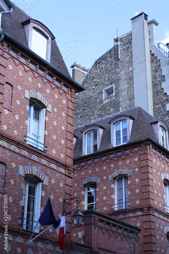 Photos Façade de bâtiment en briques rouges et pierre de taille