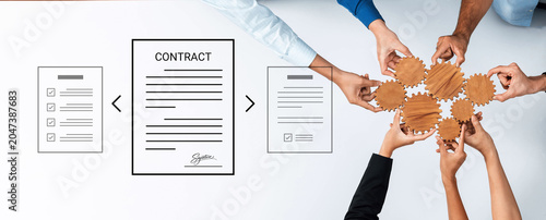 Photos Hands coming together to sign a contract showcase collaboration and partnership in a modern workspace, illustrating teamwork, negotiation, and successful agreement processes