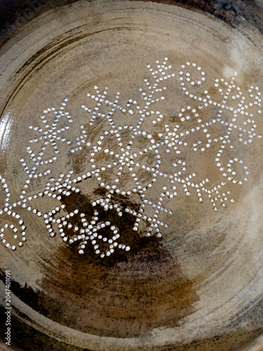 Fragments, individual decorative elements and patterns on the surface of ceramic dishes