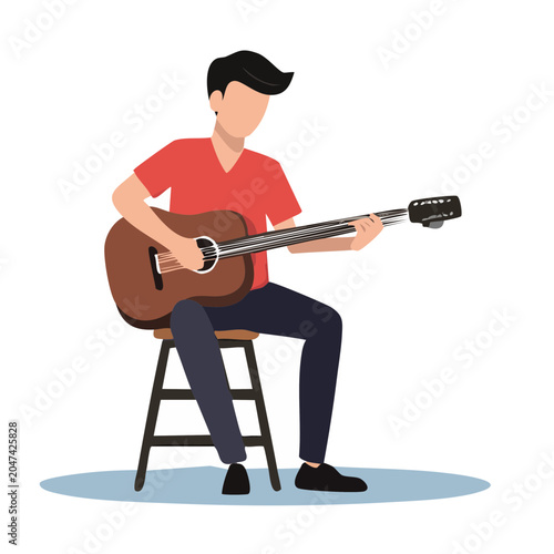 Man playing acoustic guitar sitting on a stool