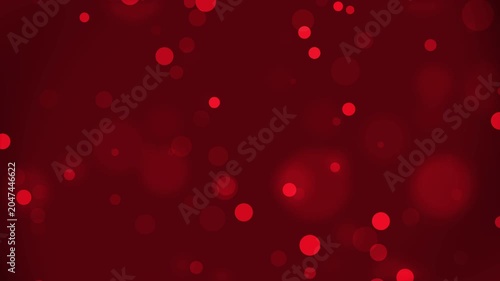 Blurry bright red light spots on dark maroon background. Suitable for festive, abstract, holidaythemed designs, backgrounds, or conceptual artistic projects.