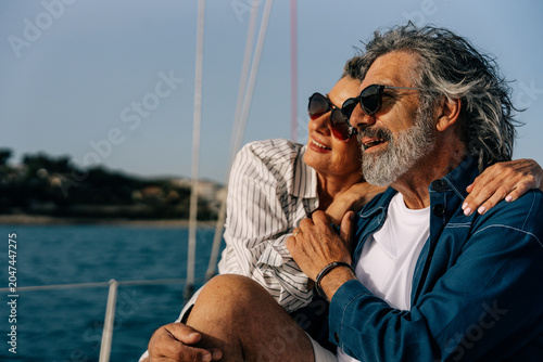 Fényképezés Senior couple enjoying sailing, luxury life, active retirement
