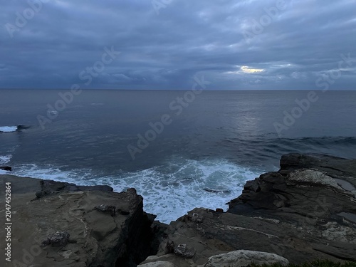 Canvas Print A powerful view of the churning sea and crashing waves against the rocky bluffs in La Jolla, California