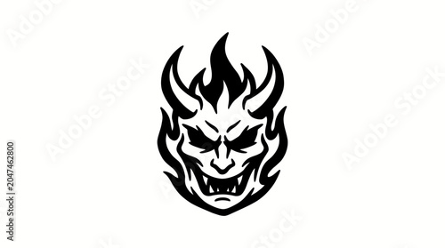 A black and white illustration of a flaming demon face.