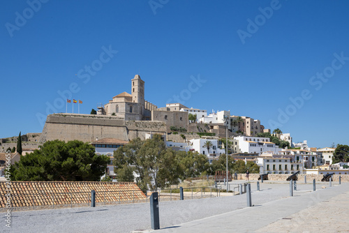 «Ibiza, Spain»; May 26 2026: View from Baluarte de Santa Lucia ancient fortress wall over the historic white houses and traditional buildings of Dalt Vila old town, a UNESCO World Heritage site
