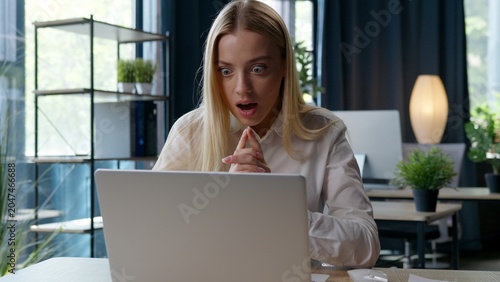 Bild auf Leinwand Happy shock wonder Caucasian businesswoman winning with laptop waiting casino wi
