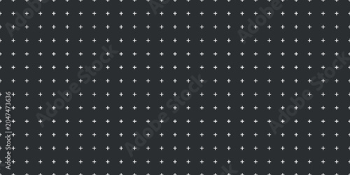 Vászonkép Small white plus marks evenly spaced across dark background creating subtle seam