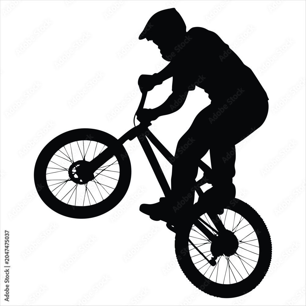 Naklejka premium Mountain bike rider silhouette doing a wheelie, extreme cycling jump vector illustration isolated on white background