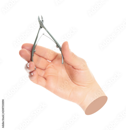 Valokuva Woman hand holds cosmetic cuticle nippers, isolated on transparent background