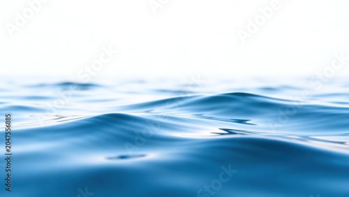 Blue ocean waves with white sky