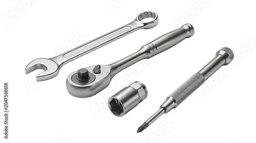Studio photography of professional tools including wrench, ratchet, socket and screwdriver isolated on background.