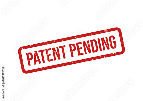 Фотография Red patent pending stamp with bold white text