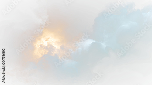 Foto Clouds in the sky during early evening with hints of orange sunlight breaking th
