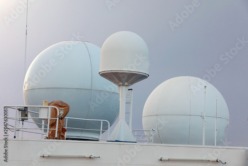 Quadro su tela White spherical radomes and satellite dome communication systems mounted on the