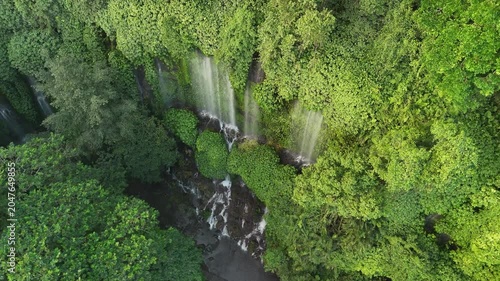 Aerial View of Benang Kelambu Waterfall in Lush Tropical Jungle, Lombok, Indonesia
