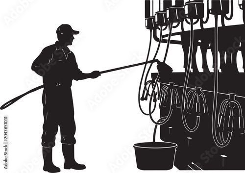 Man in silhouette cleaning horse stalls with hose and bucket