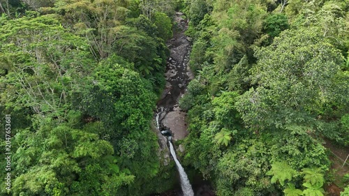 Drone Shot of Segenter Waterfall with Turquoise Natural Pool in Lombok Jungle