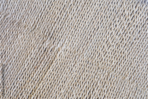 Natural woven jute texture background with diagonal pattern close up view