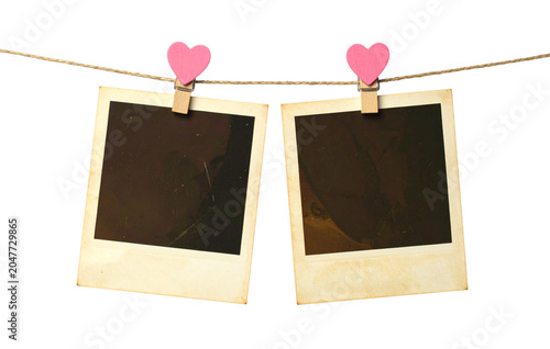 Two Blank Polaroid Frames Hanging with Decorative Heart Clips; PNG