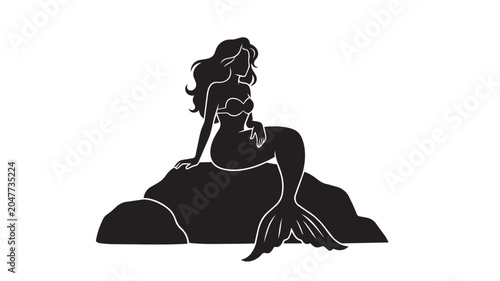 Foto Black silhouette of a mermaid sitting on a large rock