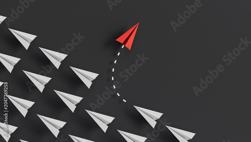 Photos Red Paper Airplane Changing Direction and Breaking Away From the Crowd of White Planes