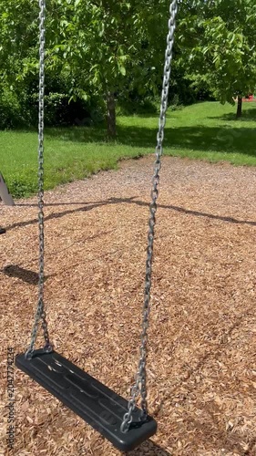 a swing swaying in the park