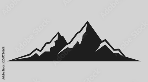 A black silhouette of a mountain range against a light gray background with a white lower section.
